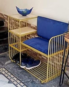 Metal shoe rack with velvet cushions
